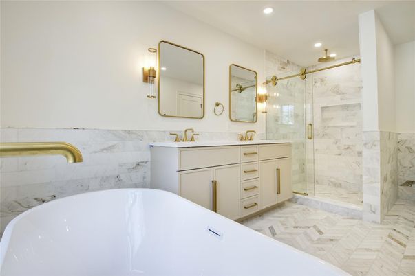Bathroom, Dual Sink Vanities, Free Standing Baths, Glass Shower, Interior, Marble, Marble Walls, Recessed Lighting