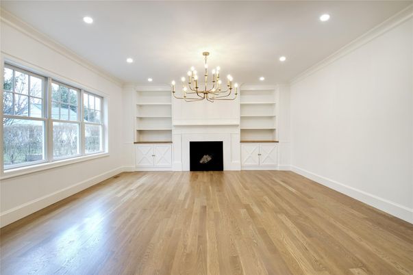 Chandelier, Empty room, Fireplace, Interior, Recessed Lighting, Wood Texture Flooring