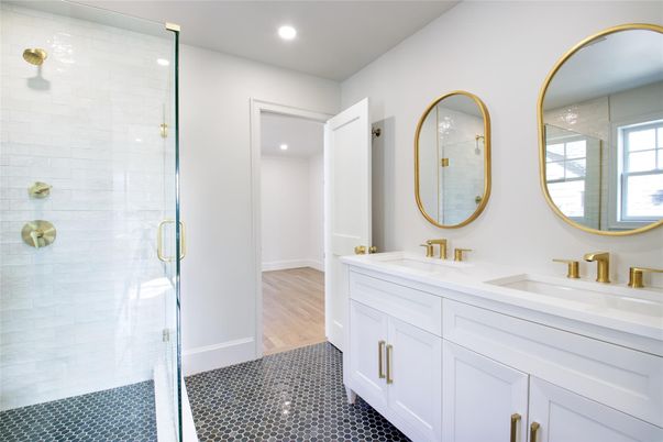 Bathroom, Dual Sink Vanities, Glass Shower, Interior, Recessed Lighting, Wood Texture Flooring