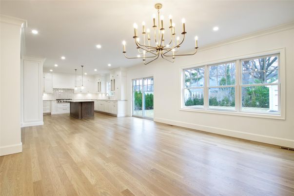 Chandelier, Empty room, Interior, Kitchen, Pendant Lights, Recessed Lighting, Stainless Steel Appliances, Wood Texture Flooring