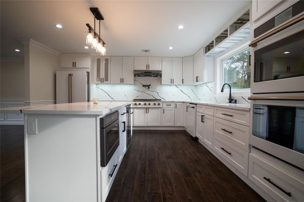 Interior, Kitchen, Marble Walls, Pendant Lights, Recessed Lighting, Stainless Steel Appliances, Wood Texture Flooring