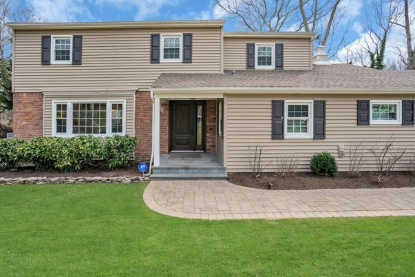 Exterior, Facade, Brick Facade, Split Level