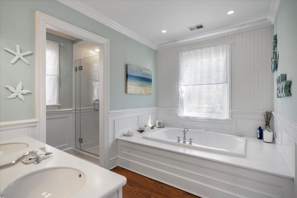 Bathroom, Dual Sink Vanities, Glass Shower, Interior, Recessed Lighting, Wood Texture Flooring