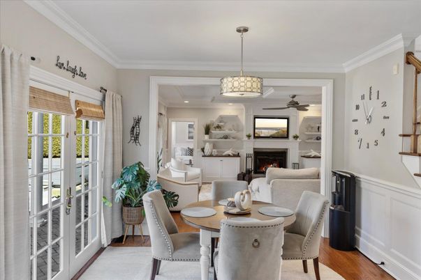 Dining room, Fireplace, Interior, Living room, Pendant Lights, Recessed Lighting, Wood Texture Flooring
