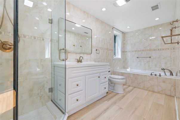 Bathroom, Glass Shower, Interior, Marble Walls, Recessed Lighting, Wood Texture Flooring