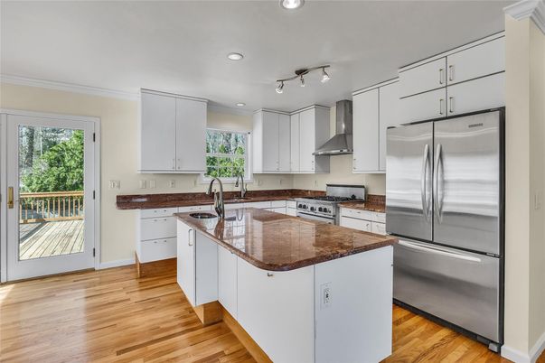 Interior, Kitchen, Recessed Lighting, Stainless Steel Appliances, Wood Texture Flooring