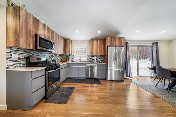 Interior, Kitchen, Recessed Lighting, Stainless Steel Appliances, Wood Texture Flooring