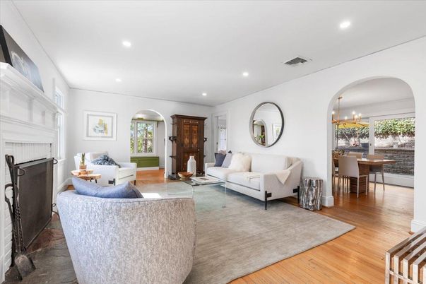 Chandelier, Dining room, Fireplace, Interior, Living room, Recessed Lighting, Wood Texture Flooring