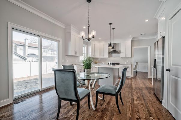 Dining room, Interior, Kitchen, Pendant Lights, Recessed Lighting, Stainless Steel Appliances, Wood Texture Flooring