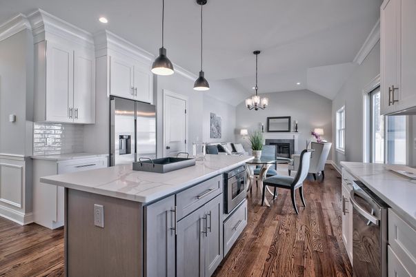 Chandelier, Dining room, Fireplace, Interior, Kitchen, Living room, Pendant Lights, Recessed Lighting, Stainless Steel Appliances, Wood Texture Flooring