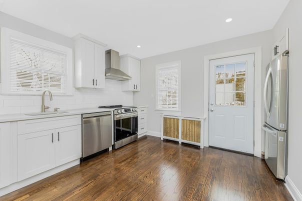 Interior, Kitchen, Recessed Lighting, Stainless Steel Appliances, Wood Texture Flooring