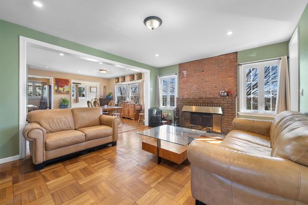 Dining room, Fireplace, Interior, Living room, Recessed Lighting, Stone Walls, Wood Texture Flooring