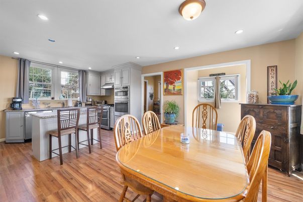 Dining room, Interior, Kitchen, Recessed Lighting, Stainless Steel Appliances, Wood Texture Flooring