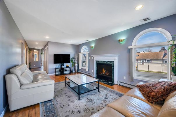 Fireplace, Interior, Living room, Recessed Lighting, Wood Texture Flooring