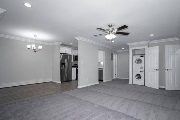 Chandelier, Empty room, Interior, Kitchen, Recessed Lighting, Stainless Steel Appliances, Wood Texture Flooring