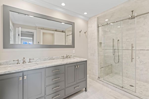 Bathroom, Dual Sink Vanities, Glass Shower, Interior, Marble, Marble Walls, Recessed Lighting