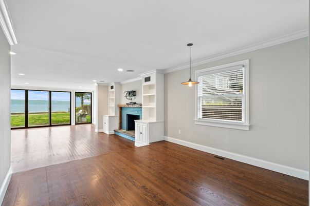 Empty room, Fireplace, Interior, Pendant Lights, Recessed Lighting, Wood Texture Flooring