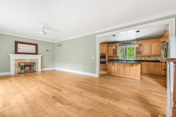Empty room, Fireplace, Interior, Kitchen, Recessed Lighting, Wood Texture Flooring