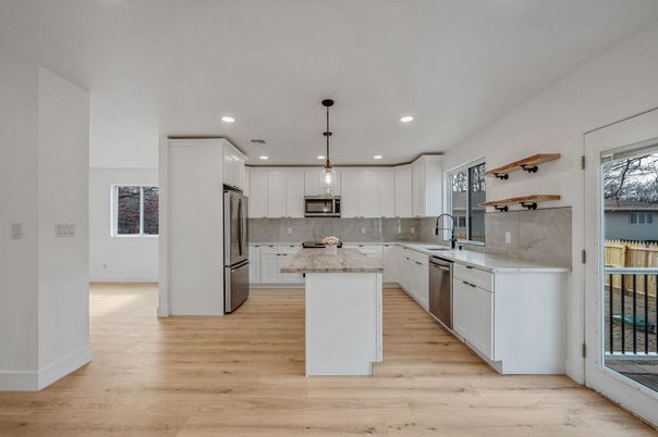 Interior, Kitchen, Pendant Lights, Recessed Lighting, Stainless Steel Appliances, Wood Texture Flooring
