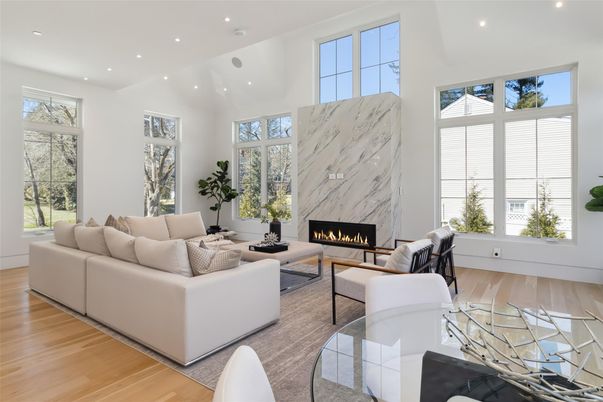 Fireplace, Interior, Living room, Marble Walls, Recessed Lighting, Wood Texture Flooring