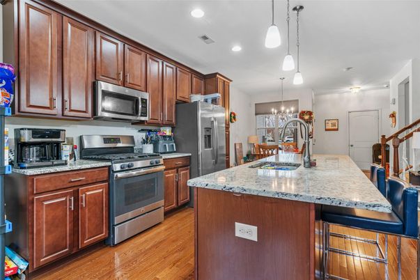 Chandelier, Interior, Kitchen, Pendant Lights, Recessed Lighting, Stainless Steel Appliances, Wood Texture Flooring