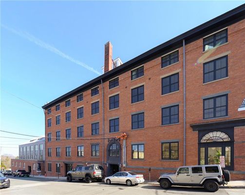 Exterior, Facade, Brick Facade, Condo Building