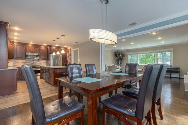 Dining room, Interior, Kitchen, Pendant Lights, Recessed Lighting, Stainless Steel Appliances, Wood Texture Flooring