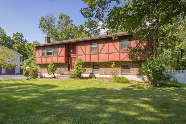 Attached, Backyard, Exterior, Facade, Brick Facade, Tudor Revival
