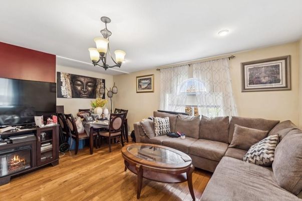 Chandelier, Dining room, Fireplace, Interior, Living room, Recessed Lighting, Wood Texture Flooring