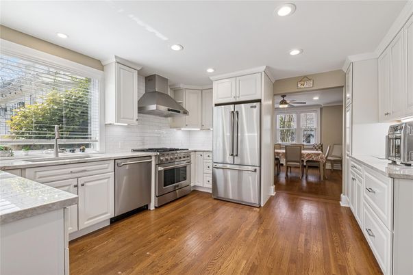 Dining room, Interior, Kitchen, Recessed Lighting, Stainless Steel Appliances, Wood Texture Flooring