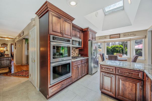 Dining room, Interior, Kitchen, Recessed Lighting, Stainless Steel Appliances, Wood Texture Flooring