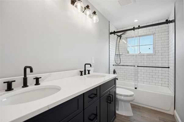 Bathroom, Dual Sink Vanities, Glass Shower, Interior, Wood Texture Flooring