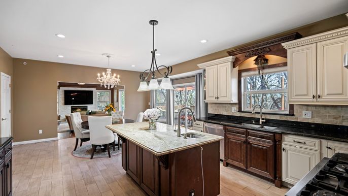 Chandelier, Dining room, Interior, Kitchen, Pendant Lights, Recessed Lighting, Stainless Steel Appliances, Wood Texture Flooring