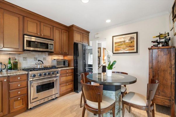 Dining room, Interior, Kitchen, Recessed Lighting, Stainless Steel Appliances, Wood Texture Flooring