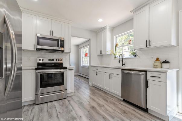 Interior, Kitchen, Recessed Lighting, Stainless Steel Appliances, Wood Texture Flooring
