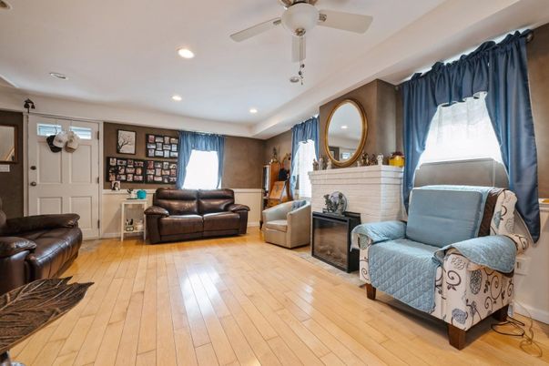 Fireplace, Interior, Living room, Recessed Lighting, Wood Texture Flooring