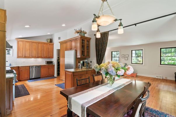 Dining room, Interior, Kitchen, Pendant Lights, Recessed Lighting, Stainless Steel Appliances, Wood Texture Flooring
