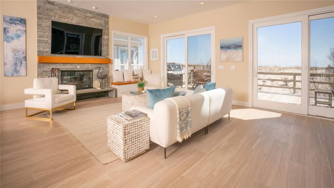 Fireplace, Interior, Living room, Recessed Lighting, Stone Walls, Wood Texture Flooring