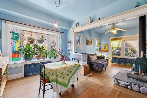 Dining room, Fireplace, Interior, Pendant Lights, Wood Texture Flooring