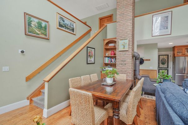 Dining room, Fireplace, Interior, Kitchen, Recessed Lighting, Stone Walls, Wood Texture Flooring