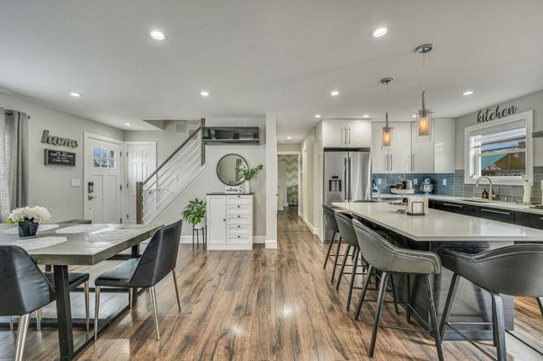 Dining room, Interior, Kitchen, Pendant Lights, Recessed Lighting, Stainless Steel Appliances, Wood Texture Flooring