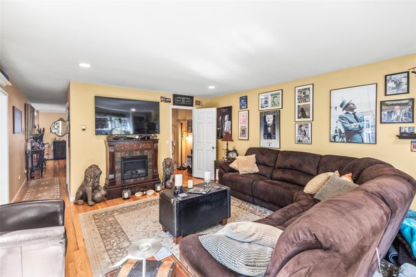Fireplace, Interior, Living room, Recessed Lighting, Wood Texture Flooring