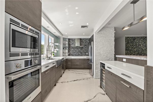 Interior, Kitchen, Pendant Lights, Recessed Lighting, Stainless Steel Appliances, Stone Walls