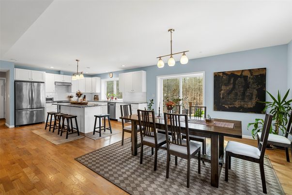 Dining room, Interior, Kitchen, Pendant Lights, Recessed Lighting, Stainless Steel Appliances, Wood Texture Flooring