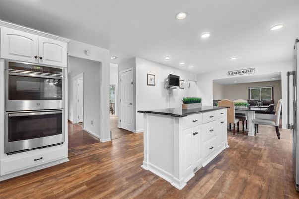 Dining room, Interior, Kitchen, Recessed Lighting, Stainless Steel Appliances, Wood Texture Flooring
