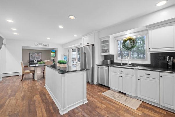Dining room, Interior, Kitchen, Recessed Lighting, Stainless Steel Appliances, Wood Texture Flooring