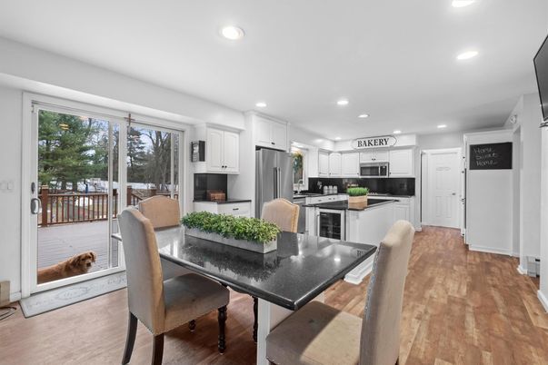 Dining room, Interior, Kitchen, Recessed Lighting, Stainless Steel Appliances, Wood Texture Flooring
