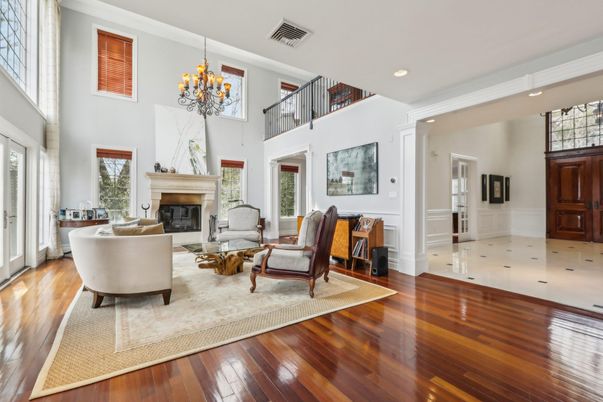 Chandelier, Fireplace, Interior, Living room, Recessed Lighting, Wood Texture Flooring