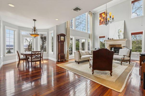 Chandelier, Dining room, Fireplace, Interior, Living room, Pendant Lights, Recessed Lighting, Wood Texture Flooring
