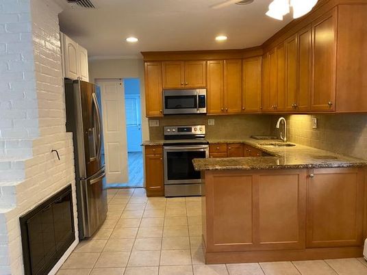Interior, Kitchen, Recessed Lighting, Stainless Steel Appliances, Stone Walls